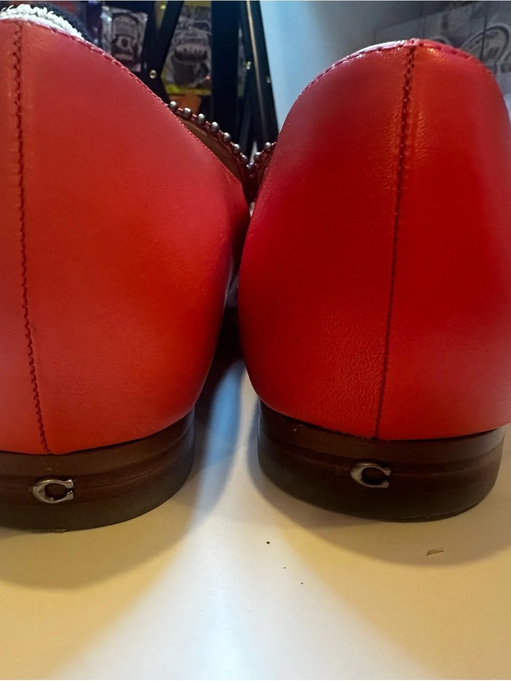 Coach tangerine Leather Stud-Trim Slip-On Loafers